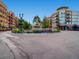 Beautiful Southglenn town center fountain surrounded by colorful flowers and buildings at 2301 E Fremont Ave # W03, Centennial, CO 80122