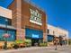 Exterior view of Whole Foods Market featuring inviting storefront and ample parking at 2301 E Fremont Ave # W03, Centennial, CO 80122