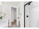 Clean bathroom with walk-in shower, white subway tile, and modern fixtures at 12352 E 30Th Ave, Aurora, CO 80011