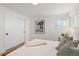 Bedroom with a sliding door closet and neutral decor at 12352 E 30Th Ave, Aurora, CO 80011