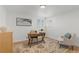 Home office with hardwood floors, a writing desk, and an accent chair at 12352 E 30Th Ave, Aurora, CO 80011