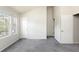 Bright bedroom with vaulted ceiling, plush carpeting, and access to a walk-in closet and an ensuite bathroom at 3098 W 107Th Pl # C, Westminster, CO 80031