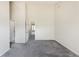 Spacious bedroom with carpet flooring, vaulted ceilings, and multiple entrances that lead to other rooms at 3098 W 107Th Pl # C, Westminster, CO 80031