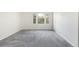 Spacious bedroom with carpet flooring, and a large window offering plenty of natural light at 3098 W 107Th Pl # C, Westminster, CO 80031