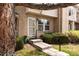 Inviting front entrance with steps, railing, and manicured landscaping leading to the front door at 3098 W 107Th Pl # C, Westminster, CO 80031