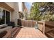 Private patio area with brick pavers, wood fence, and easy access to the home's exterior at 3098 W 107Th Pl # C, Westminster, CO 80031