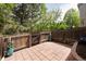 Private patio area with wood fence, brick pavers, and greenery; perfect for outdoor relaxation at 3098 W 107Th Pl # C, Westminster, CO 80031