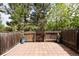 Private patio with brick pavers, wood fence, and flower pots offering outdoor enjoyment at 3098 W 107Th Pl # C, Westminster, CO 80031