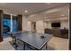 Finished basement with ping pong table and sitting area at 3438 Cade Ct, Castle Rock, CO 80104