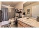 Clean bathroom with a bathtub, toilet, and vanity at 3438 Cade Ct, Castle Rock, CO 80104