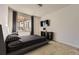 Modern bedroom with a platform bed and a flat-screen TV at 3438 Cade Ct, Castle Rock, CO 80104