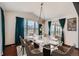 Elegant dining room with a chandelier and hardwood floors at 3438 Cade Ct, Castle Rock, CO 80104