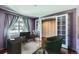 Home office with built-in shelving and hardwood floors at 3438 Cade Ct, Castle Rock, CO 80104