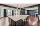 Modern kitchen island with white quartz countertop at 3438 Cade Ct, Castle Rock, CO 80104