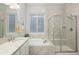 Bathroom boasts a soaking tub and walk-in shower at 7394 S Scottsburg Way, Aurora, CO 80016