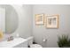 Convenient powder room with toilet and sink at 7394 S Scottsburg Way, Aurora, CO 80016