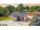 Aerial view of a charming single-Gathering home with well-maintained landscaping and a long driveway at 4645 E Florida Ave, Denver, CO 80222