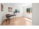 Bright home office with wood floors and windows providing ample natural light at 4645 E Florida Ave, Denver, CO 80222