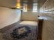 Spacious basement with exposed brick and carpeted floors at 75 Pierce St, Lakewood, CO 80226