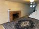 Basement with fireplace and access to staircase at 75 Pierce St, Lakewood, CO 80226