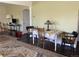 Inviting dining room with decorative rug and wood dining table at 75 Pierce St, Lakewood, CO 80226