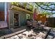 Inviting backyard patio with outdoor dining furniture, perfect for entertaining and enjoying the serene outdoor space at 433 Fox St, Denver, CO 80204