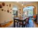 Inviting dining room with archway access and a view to a well-lit kitchen at 433 Fox St, Denver, CO 80204