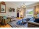 Comfortable living room with a plush sofa, patterned rug, and lots of natural light at 433 Fox St, Denver, CO 80204