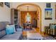 Open-concept living room showcasing a view to the dining area and hardwood flooring at 433 Fox St, Denver, CO 80204