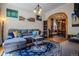 Cozy living room with comfortable seating, decorative art, and an open layout at 433 Fox St, Denver, CO 80204