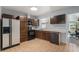 Functional kitchen space with ample cabinet storage and modern features at 7644 Wyandot St, Denver, CO 80221