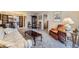 Cozy living room featuring neutral carpeting and furnishings, creating an inviting atmosphere at 170 S Fenton St, Lakewood, CO 80226