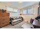 Office featuring carpet, a love seat, and windows at 170 S Fenton St, Lakewood, CO 80226