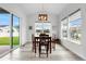 Bright dining room with natural light and sliding glass door at 5597 Pinto Valley St, Parker, CO 80134
