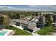 Aerial view of a home and its surrounding neighborhood with mature trees and manicured lawns at 7172 S Vine Cir, Centennial, CO 80122