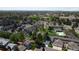 Aerial view showcasing the property's location within a neighborhood, with nearby parks and amenities at 7172 S Vine Cir, Centennial, CO 80122