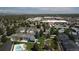 Aerial view showing the property in relation to the community amenities, like the pool and green spaces at 7172 S Vine Cir, Centennial, CO 80122