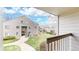Well-manicured lawn outside of apartment building with pathway at 3600 S Pierce St # 5-202, Denver, CO 80235