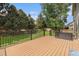 Backyard deck area that overlooks the outdoor landscaping at 9346 Lark Sparrow Dr, Highlands Ranch, CO 80126