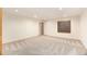 Spacious basement area with neutral carpet, recessed lighting, and a window at 9346 Lark Sparrow Dr, Highlands Ranch, CO 80126