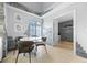 Modern dining area with table and chairs, adjacent to entryway at 13824 E Lehigh Ave # B, Aurora, CO 80014