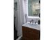 Stylishly designed bathroom with modern sink, black fixtures and subway tile in the shower area at 8950 W 26Th, Lakewood, CO 80215