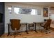 Bright office space with modern desks, ergonomic chairs, and ample natural light at 8950 W 26Th, Lakewood, CO 80215