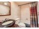 Classic bathroom with a traditional vanity and a shower-tub combination for a functional and comfortable space at 1050 N Corona St # 308, Denver, CO 80218
