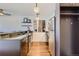 Well-organized kitchen with stainless steel appliances, granite countertops, and open shelving for a sleek and functional design at 1050 N Corona St # 308, Denver, CO 80218
