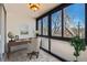 Bright office space featuring floor-to-ceiling windows and a unique mosaic tile floor at 1050 N Corona St # 308, Denver, CO 80218