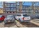 Designated parking lot behind the building for residents' vehicles at 1050 N Corona St # 308, Denver, CO 80218