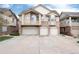 Charming two-story townhouse featuring a private balcony and attached two-car garage at 341 Granby Way # A, Aurora, CO 80011