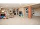 Finished basement area with washer/dryer hookups, storage, and room to play at 3315 N Stuart St, Denver, CO 80212