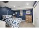 Nicely decorated bedroom featuring carpeting, dresser, and ample closet space at 3315 N Stuart St, Denver, CO 80212